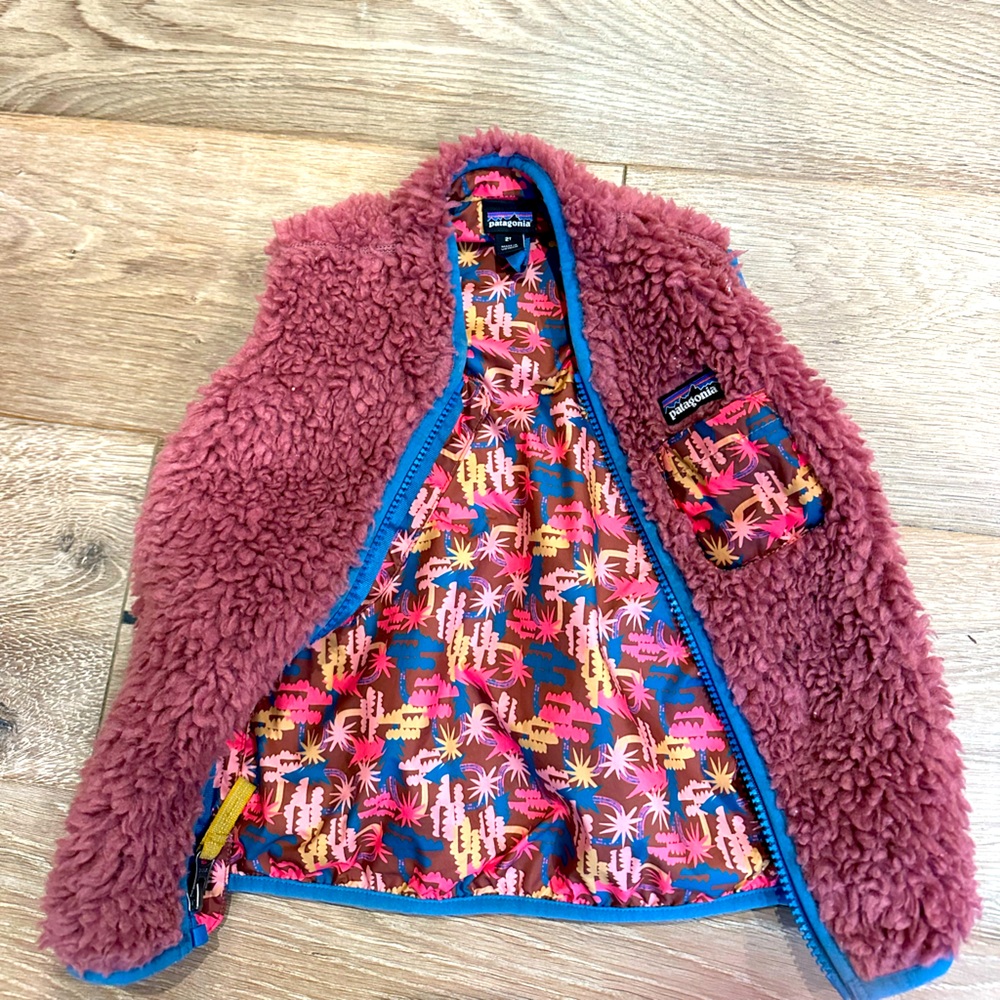 Cozy Sherpa vest, never worn and from fragrance free home. Size 2t
